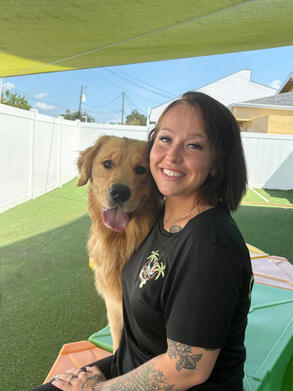 Team member with dog